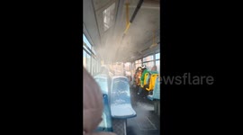 Unexpected snow showers inside bus in northern China