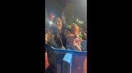 Man tricks his partner to get into a children's ride holding a pint of cider *Hilarious*