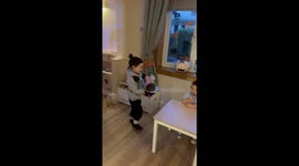 Creative girl & baby sister recreate the iconic cake scene from 'Matilda'