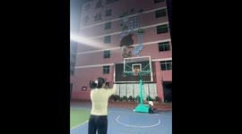 Girl's epic basketball shot takes comical turn