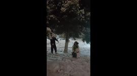 Man surprisingly does split when kicks tree to make snowfall in Northeast China