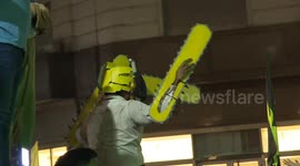 'Chainsaw' wielding fan celebrates in Buenos Aires as Javier Milei wins presidential election