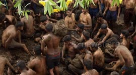 Indian villagers celebrate end of Diwali by throwing cow dung at each other