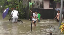 Heavy rainfall closes schools and prompts evacuations in Bulan, Sorsogon Province, Philippines