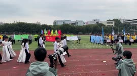 Boy steals show in waltz performance wearing long gown dress