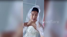 Groom's best friend dresses as bride for hilarious wedding prank in China