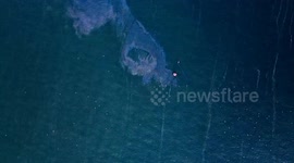 Huge oil slick after fishing trawler runs aground in New Jersey