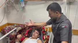 Evacuees from North Gaza's Indonesian Hospital arrive at South Gaza's Nasser Hospital in Khan Yunis