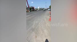 Kind pedestrian rescues terrified stray kitten lost in road