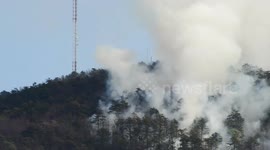 Sauratown mountain blaze: firefighters battle uncontained wild fire