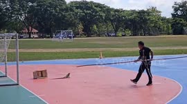 Bungling teacher tries to catch escaped pet iguana at school