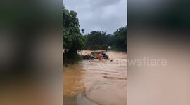 People struggle in flash flood in souther Thailand