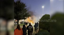 Small plane engulfed in flames after it crashed into a Texas shopping centre