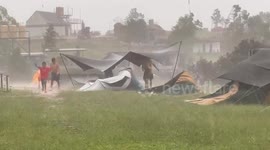 Campers struggle as storm flattens tents in northeast Thailand