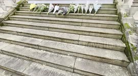 Floral tributes to four teenage friends who were killed in camping trip crash left on college steps