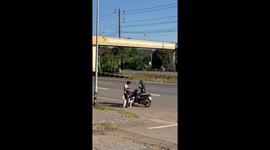 Pet dog sends off boy to school and jumps on motorcycle's back to ride home