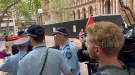 Police threaten to arrest man holding Israeli flag at School Strike for Palestine