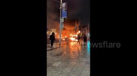 Vehicles burn at riots in Dublin following knife attack on 3 children and 1 adult outside primary school