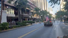 Israel Supporter Trump supporter drives through Waikiki hawaii with flags of trump and Israel