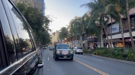 Israel Supporter Trump supporter drives through Waikiki hawaii with flags of trump and Israel
