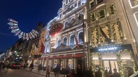 Glittering Christmas shop displays line Bond Street in London