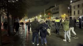 Two men led away by police in Dublin following violent scenes on Thursday night