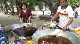 Locals make hundreds of candles for upcoming lantern festival in Thailand