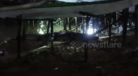 Sinister crocodile sparks panic lurking under stilt houses in the Philippines