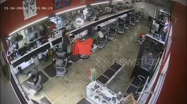 Customer at barbershop had a close shave when truck smashed through the window