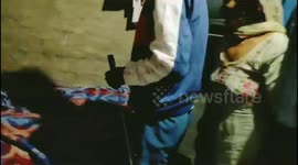 A family got shocked to see a cobra snake next to them on their bed when they woke up in the morning