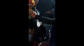 Cat Stashed in Purse at the Club