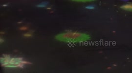 Digital flower baskets beamed onto canal to stop pollution for Loy Krathong festival in Thailand
