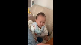 Dad tricks crying baby by feeding her air