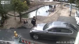Heroic man rescues drowning boy from pond following his companion's frantic calls for help in China