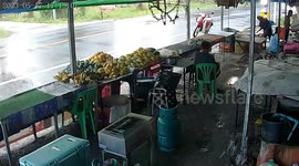 Pickup truck rams fruit stand and narrowly misses vendors