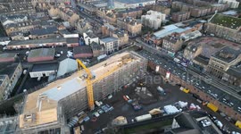 *NEW VIDEO* Crane collapses and crashes into building site in Edinburgh