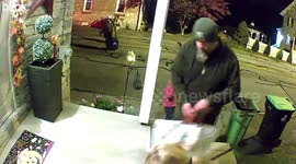 Man Helps Himself To Handfuls Of Candy
