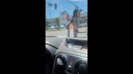 Car Window Cleaner Asks for Card Payment