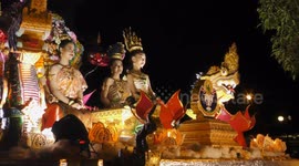Thailand's most beautiful festival closes with a grand royal procession of giant floats