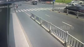 Driver swerves into road barricades to avoid car making U-turn
