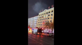 Alert resident reports early morning fire on building in China