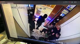 Alleged drunk guests kick room service robot out of elevator in Chinese hotel