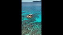 Boat Gets Bizarrely Stuck on a Rock