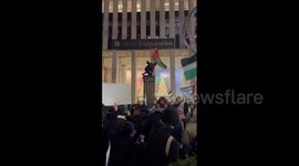 US: Pro-Palestine Protesters Rally Near Rockefeller Center Ahead Of Tree Lighting Ceremony
