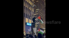 US: Pro-Palestine Protesters Rally Near Rockefeller Center Ahead Of Tree Lighting Ceremony 3