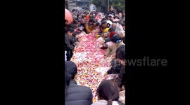 Chaos erupts as shoppers scramble for 10-metre anniversary cake at Chinese mall