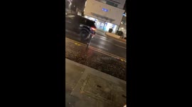 VIDEO: Yobs aimed fireworks at police station leaving one cop hurt before hero rugby tackles one to ground
