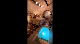 Stay in a hotel with incredible 300-year-old wine cellar turned swimming pool in the BEDROOM