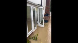 Bloke cracks open beer while watching devastating flood cause £5,000 worth of damage to his home
