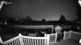 Doorbell Camera Captures Drunk Guy Falling Over Railing